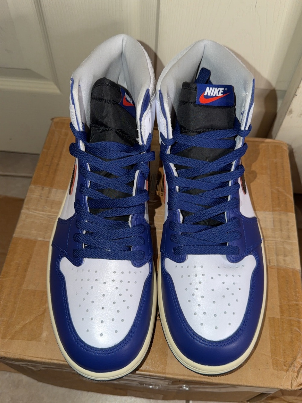 Nike Men’s High-Top Sneakers in White and Blue